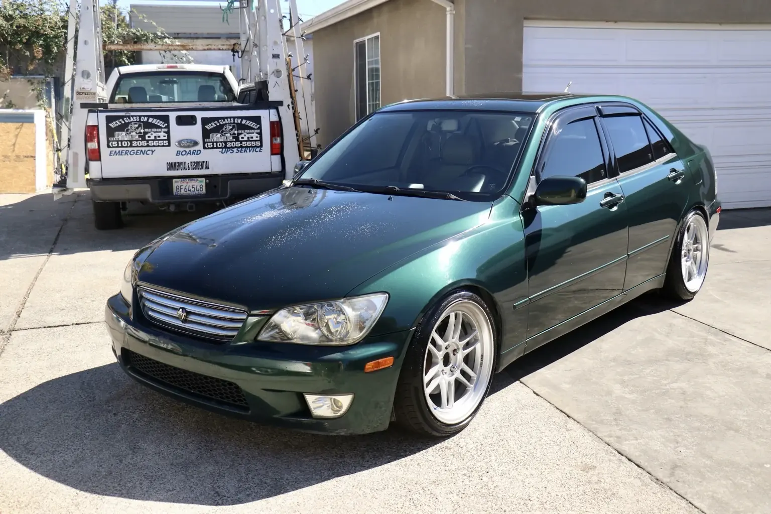 Hi-Caliber Culture Vault after photo of a green Lexus IS300