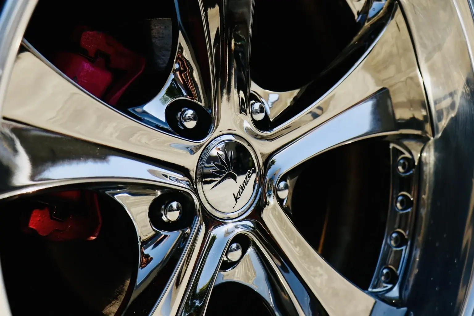 Hi-Caliber Culture Vault detail photography of a polished wheel and brake setup